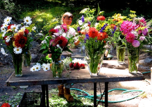 Co-owner Shanti arranges her farm-cut flower bouquets, a bargain $11